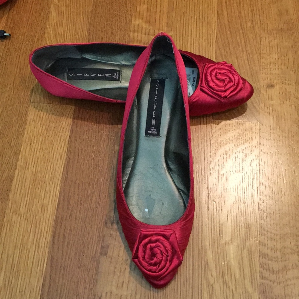 Satin Flats with satin rosettes.